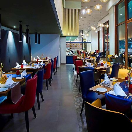 Grand Mercure Mysore - An Accor Brand Buitenkant foto The interior of the restaurant