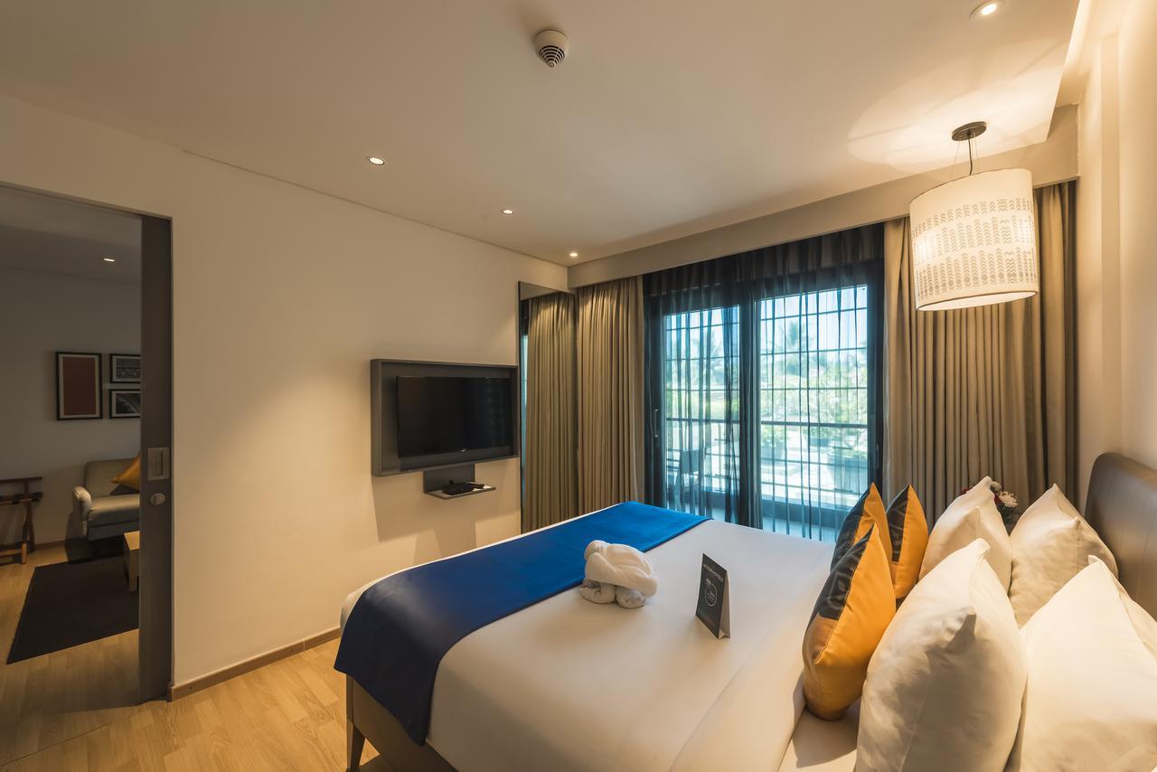Grand Mercure Mysore - An Accor Brand Buitenkant foto A bedroom at the Park